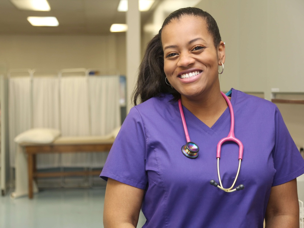 Physician Assistant - Woman smiling at the camera