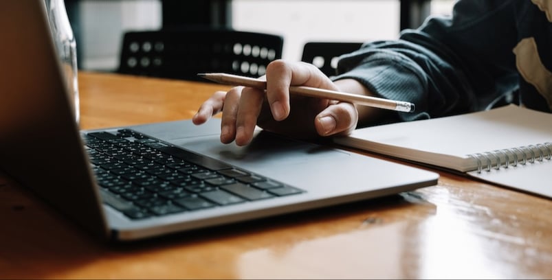 student on laptop going back to school